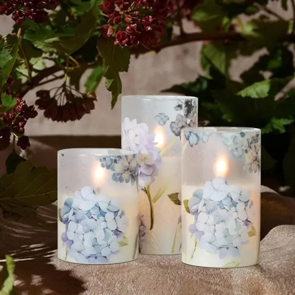 Eldnacele Snowman Glass Flameless Candles with Remote Timer Battery Operated Flickering LED Pillar Candles 3 Pack Warm White Light Christmas Decal Candles Set of 3 D3 x H 4 5 6  SnowmanBlue