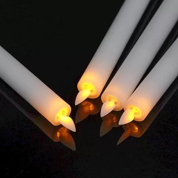 Eldnacele Flameless Flickering Taper Candles with Remote and Timer Window Candles Warm Real Wax Unscented 952 Pack White for Home Wedding Party Christmas Decoration4 Pack White