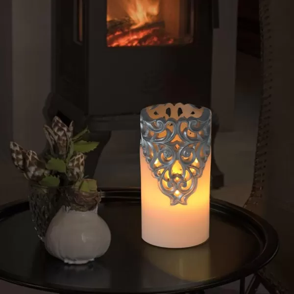 Eldnacele Flameless Christmas Silver Candles with 5H Timer Flickering Real Wax Battery Operated Pillar Candles for Christmas Party Decoration Silver D3 x H6Silver