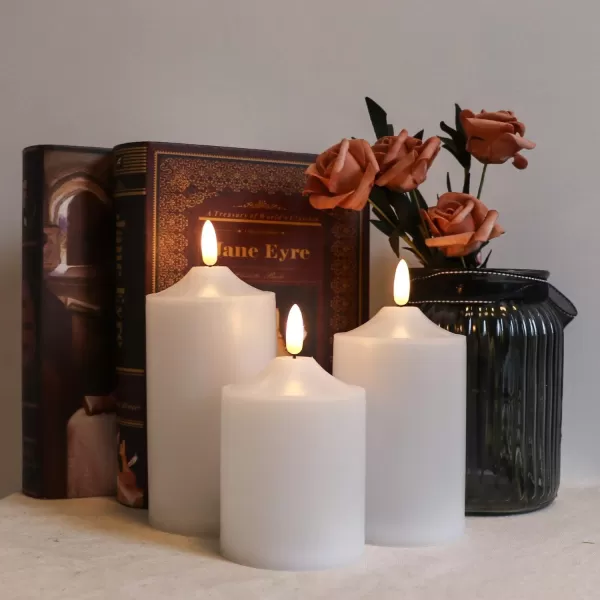 Eldnacele Flameless Votive Candles with Timer Bulk IndoorOutdoor Waterproof Tealight Candles Realistic Flickering Battery Operated LED Votive Candle Lights Pack of 12White