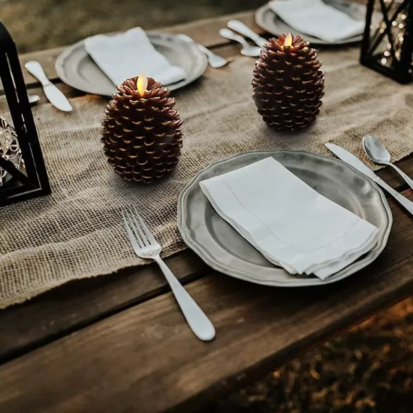Eldnacele LED Pine Cone Candles with Remote Timer Battery Operated Flameless Candles Unscented Wax Pinecone Candles White 2 Pack for Christmas Home Party DecorationBrown