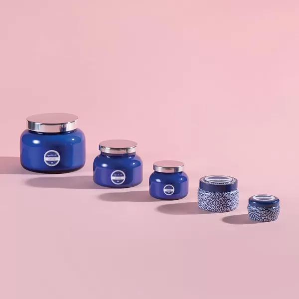 Capri Blue Aloha Orchid Tin Candle  85 Oz  Petite Travel Candle  Luxury Aromatherapy Candle