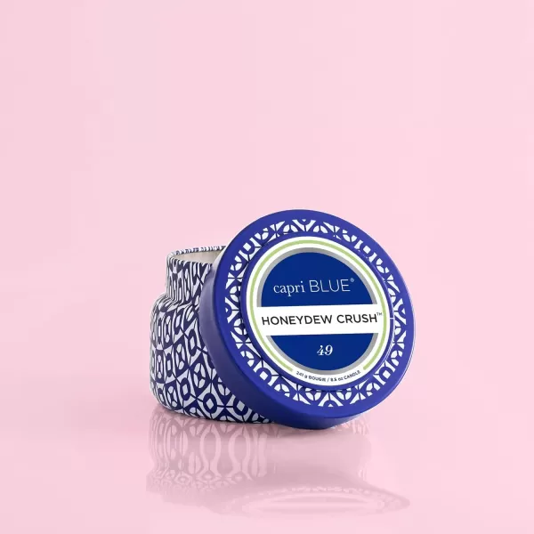 Capri Blue Honeydew Crush Scented Candle  Signature Printed Travel Tin Jar Candle  Luxury Aromatherapy Candle with a Soy Wax Blend  Blue Candle 85 oz