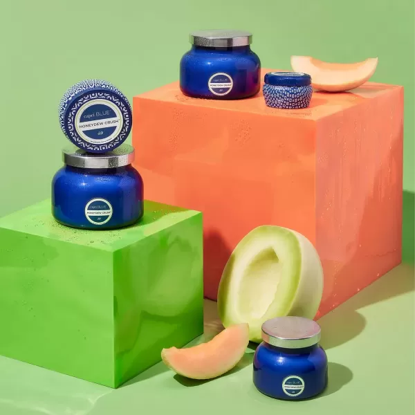 Capri Blue Honeydew Crush Scented Candle  Signature Printed Travel Tin Jar Candle  Luxury Aromatherapy Candle with a Soy Wax Blend  Blue Candle 85 oz
