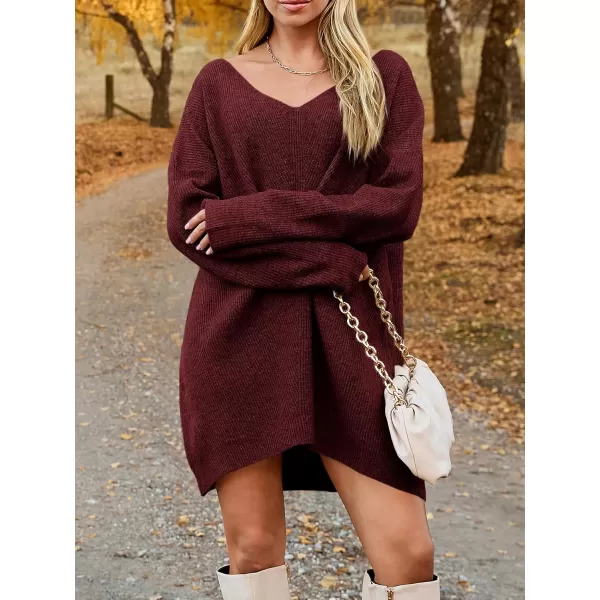 imageSaodimallsu Womens Oversized Sweater Dress Fall V Neck Long Sleeve Ribbed Knit Casual Loose Mini Pullover DressesWine Red