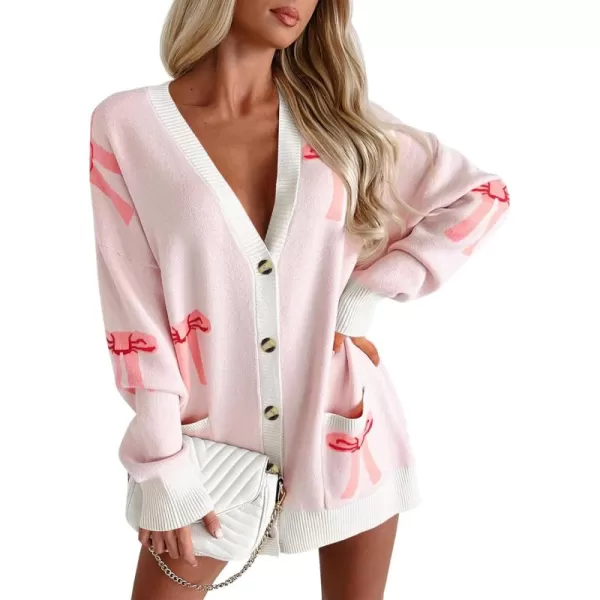 imageSaodimallsu Womens Oversized Cardigan Sweaters Bow Printed Button V Neck Long Sleeve Loose Knit Fall Trendy CoatsPink