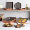 imageGoodful AllInOne Nonstick Bakeware Set Stackable and Space Saving Design includes Round and Square Pans Muffin Pans Cookie Sheet and Roaster Dishwasher Safe 8Piece Blue MistTerracotta