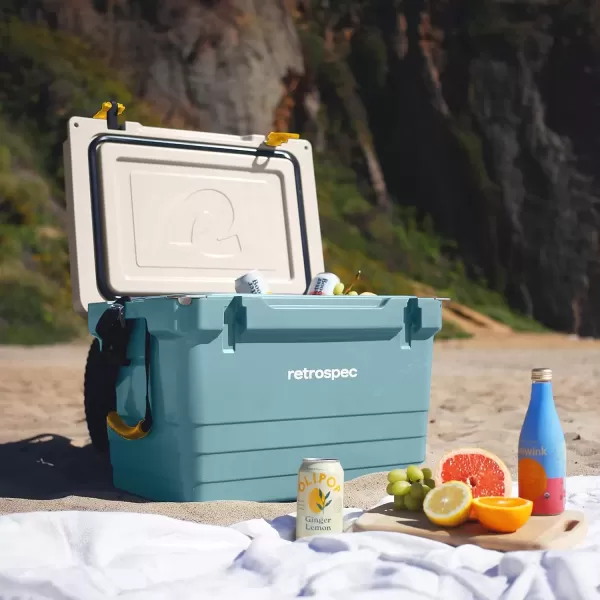 imageRetrospec Palisade Rotomolded Cooler  Fully Insulated Portable Ice Chest with Built in Bottle Opener TieDown Slots ampamp Dry Goods Basket  Large Beach Camping ampamp Travel Coolers 25 45 ampamp 65qtCoastal Blue