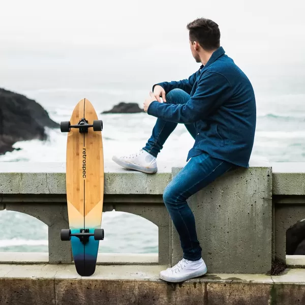 imageRetrospec Zed Cruiser ampamp Pintail Longboard Skateboard Complete Cruiser  Bamboo ampamp Canadian Maple Wood Cruiser wReverse Kingpin Trucks for Commuting Cruising Carving ampamp Downhill RidingDark Tropics