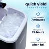 imageNostalgia Thermostar Automatic SelfCleaning Portable Electric Countertop Ice Maker Machine With Handle26 Pounds in 24 Hours with Ice Scoop and BasketPerfect for Water BottlesDrinksPartiesSilverBlack