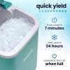 imageNostalgia Thermostar Automatic SelfCleaning Portable Electric Countertop Ice Maker Machine With Handle26 Pounds in 24 Hours with Ice Scoop and BasketPerfect for Water BottlesDrinksPartiesSilverAqua