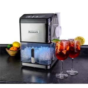 imageNostalgia Thermostar Automatic SelfCleaning Portable Electric Countertop Ice Maker Machine With Handle26 Pounds in 24 Hours with Ice Scoop and BasketPerfect for Water BottlesDrinksPartiesSilverStainless Steel