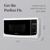 imageFarberware Countertop Microwave 700 Watts 07 Cu Ft  Microwave Oven With LED Lighting and Child Lock  Perfect for Apartments and Dorms  Easy Clean Grey Interior Retro BlackWhite