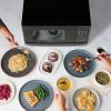 imageFarberware Countertop Microwave 700 Watts 07 Cu Ft  Microwave Oven With LED Lighting and Child Lock  Perfect for Apartments and Dorms  Easy Clean Grey Interior Retro BlackBlack
