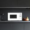 imageFarberware Countertop Microwave 700 Watts 07 Cu Ft  Microwave Oven With LED Lighting and Child Lock  Perfect for Apartments and Dorms  Easy Clean Grey Interior Retro BlackWhite