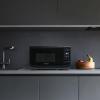 imageFarberware Countertop Microwave 700 Watts 07 Cu Ft  Microwave Oven With LED Lighting and Child Lock  Perfect for Apartments and Dorms  Easy Clean Grey Interior Retro BlackBlack