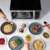 imageFarberware Countertop Microwave 700 Watts 07 Cu Ft  Microwave Oven With LED Lighting and Child Lock  Perfect for Apartments and Dorms  Easy Clean Grey Interior Retro BlackStainless Steel