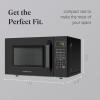 imageFarberware FM09SSE Classic Countertop Microwave Oven 900Watt with LED Lighting Child Lock Easy Clean Interior 09 Cu Ft Stainless Steel11 Cu Ft Black