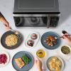 imageFarberware FMO11AHTBKBD1 Countertop 1000 Watts Microwave Oven with LED Lighting and Child LockPerfect for Apartments and DormsEasy Clean 11 cu ft Stainless Steel16 Cu Ft Stainless w Sensor