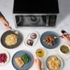 imageFarberware FMO11AHTBKBD1 Countertop 1000 Watts Microwave Oven with LED Lighting and Child LockPerfect for Apartments and DormsEasy Clean 11 cu ft Stainless Steel12 Cu Ft Stainless Grill