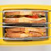 imageNostalgia CocaCola Grilled Cheese Toaster with EasyClean Toaster Baskets and Adjustable Toasting Dial Red 2SlotGrilled Cheese Toaster Kraft