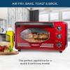 imageNostalgia Oven Toast AirFry Broil Functions Large Capacity Fits Slices of Bread Two 12 in PizzasIncludes Baking Pan and Frying Basket 21 Qt AquaToaster Oven Red