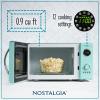 imageNostalgia Retro Compact Countertop Microwave Oven  07 Cu Ft  700Watts with LED Digital Display  Child Lock  Easy Clean Interior  OrangeAqua