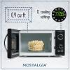 imageNostalgia Retro Compact Countertop Microwave Oven  07 Cu Ft  700Watts with LED Digital Display  Child Lock  Easy Clean Interior  OrangeBlack