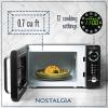imageNostalgia Retro Compact Countertop Microwave Oven  07 Cu Ft  700Watts with LED Digital Display  Child Lock  Easy Clean Interior  OrangeBlack