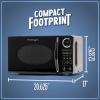 imageNostalgia Retro Compact Countertop Microwave Oven  07 Cu Ft  700Watts with LED Digital Display  Child Lock  Easy Clean Interior  OrangeBlack