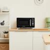 imageNostalgia Retro Compact Countertop Microwave Oven  07 Cu Ft  700Watts with LED Digital Display  Child Lock  Easy Clean Interior  OrangeBlack