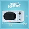 imageNostalgia Retro Compact Countertop Microwave Oven  07 Cu Ft  700Watts with LED Digital Display  Child Lock  Easy Clean Interior  OrangeBlue