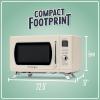 imageNostalgia Retro Compact Countertop Microwave Oven  07 Cu Ft  700Watts with LED Digital Display  Child Lock  Easy Clean Interior  OrangeCream