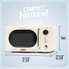 imageNostalgia Retro Compact Countertop Microwave Oven  07 Cu Ft  700Watts with LED Digital Display  Child Lock  Easy Clean Interior  OrangeIvory