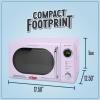 imageNostalgia Retro Compact Countertop Microwave Oven  07 Cu Ft  700Watts with LED Digital Display  Child Lock  Easy Clean Interior  OrangeLavender