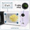 imageNostalgia Retro Compact Countertop Microwave Oven  07 Cu Ft  700Watts with LED Digital Display  Child Lock  Easy Clean Interior  OrangeLavender