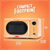 imageNostalgia Retro Compact Countertop Microwave Oven  07 Cu Ft  700Watts with LED Digital Display  Child Lock  Easy Clean Interior  OrangeOrange