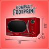 imageNostalgia Retro Compact Countertop Microwave Oven  07 Cu Ft  700Watts with LED Digital Display  Child Lock  Easy Clean Interior  OrangeRed