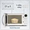 imageNostalgia Retro Compact Countertop Microwave Oven  07 Cu Ft  700Watts with LED Digital Display  Child Lock  Easy Clean Interior  OrangeWhite