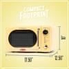 imageNostalgia Retro Compact Countertop Microwave Oven  07 Cu Ft  700Watts with LED Digital Display  Child Lock  Easy Clean Interior  OrangeYellow