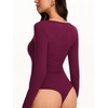 image:imageREORIA Womens Sexy Deep V Neck Long Sleeve Bodysuit Metal Ring Cutout TopsCordovan