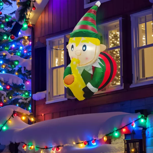 OurWarm 35 Ft Christmas Inflatables Outdoor Decorations Christmas Inflatable Elf Playing Saxophone Broke Out from Window Builtin LED Lights Xmas Blow up Decor for Outside Indoor Yard Garden HomeSaxophone Elf
