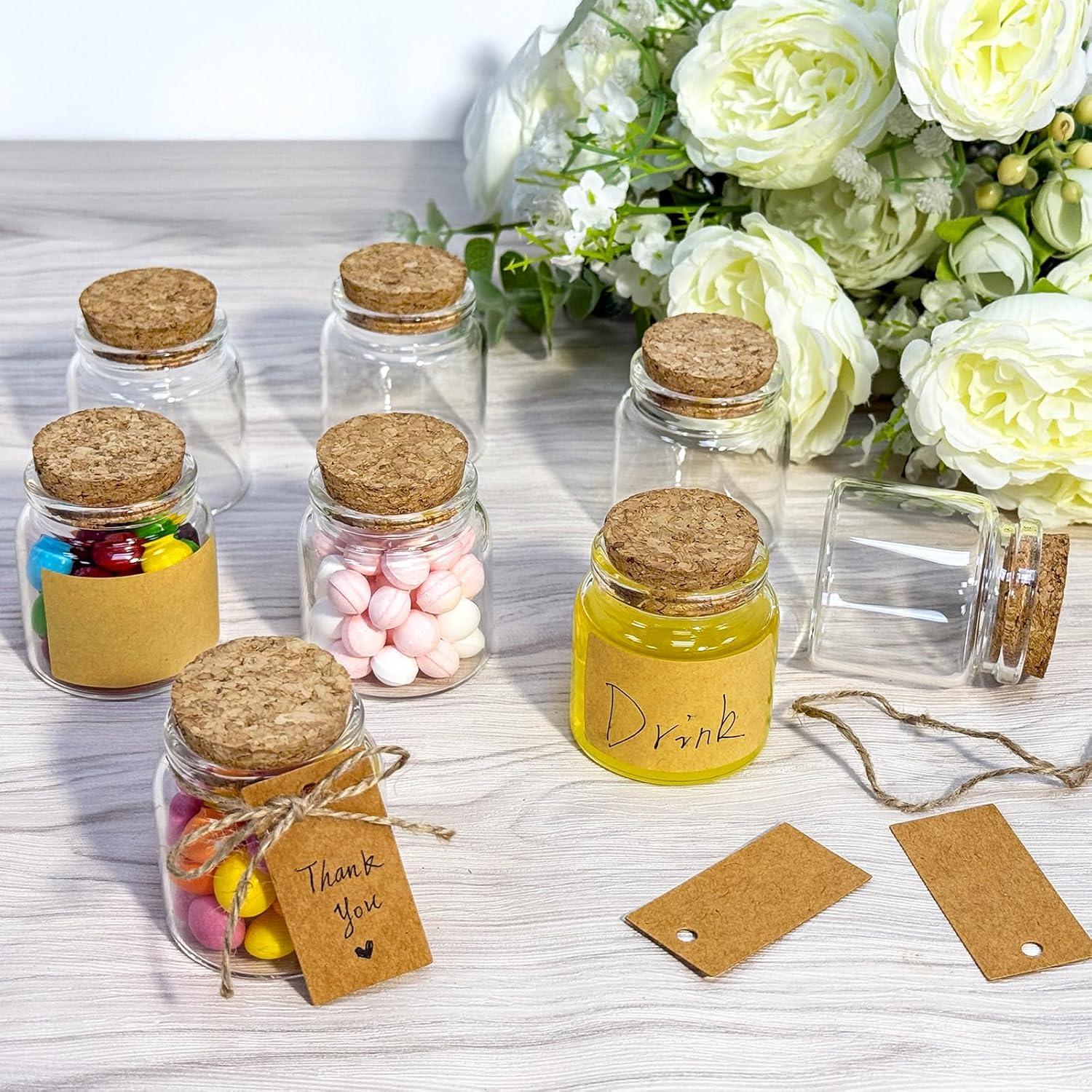 imageOurWarm 12 Pack Mini Jars with Lids 17OZ Small Glass Bottles with Cork Tag Label and Twine Versatile Small Glass Jars for Candy Potion Spice DIY Crafts Gift Birthday Wedding Party Decorations12pcs  50ml