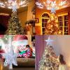 imageOurWarm Christmas Tree Topper Lighted Star Tree Toppers with LED Rotating Snowflake Projector Lights 3D Hollow Silver Star Snow Tree Topper for Christmas Tree DecorationsSilver Star