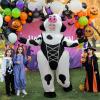 imageOurWarm Adult Inflatable Cow Costume  Black Shapewear Funny Blow Up Costume for Halloween Cosplay Party