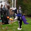 imageOurWarm Horse Inflatable Costume Kids Funny Inflatable Halloween Costumes Riding a Skeleton Horse with Red LED Eyes Cowboy Blow up Costumes for Boys Girls Halloween Cosplay Party