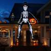 imageOurWarm 10ft Halloween Inflatable Outdoor Decoration Giant Sitting Skeleton Inflatable Halloween Decorations with Buildin LEDs Halloween Blow Up Yard Decorations for Roof Balcony Lawn GardenSitting Skeleton Inflatable