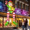 imageOurWarm 10FT Christmas Inflatable Outdoor Decoration Giant Sitting Elf Inflatable Christmas Decorations Outdoor with Builtin LEDs Christmas Blow Up Yard Decorations for Roof Balcony Lawn
