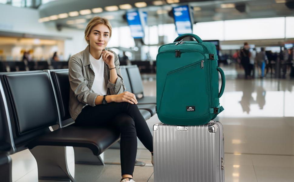 imageMATEIN Purple Travel Backpack Large Capacity Carry on Backpack with Detachable Shoulder Straps Water Resistant Personal Item Bag for Traveler Traveling Essential for WomenPeacock Blue