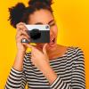 imageKodak Printomatic Digital Instant Print Camera Neon Green with Kodak 2x3 Premium ZINK Photo Paper 50 SheetsBlack
